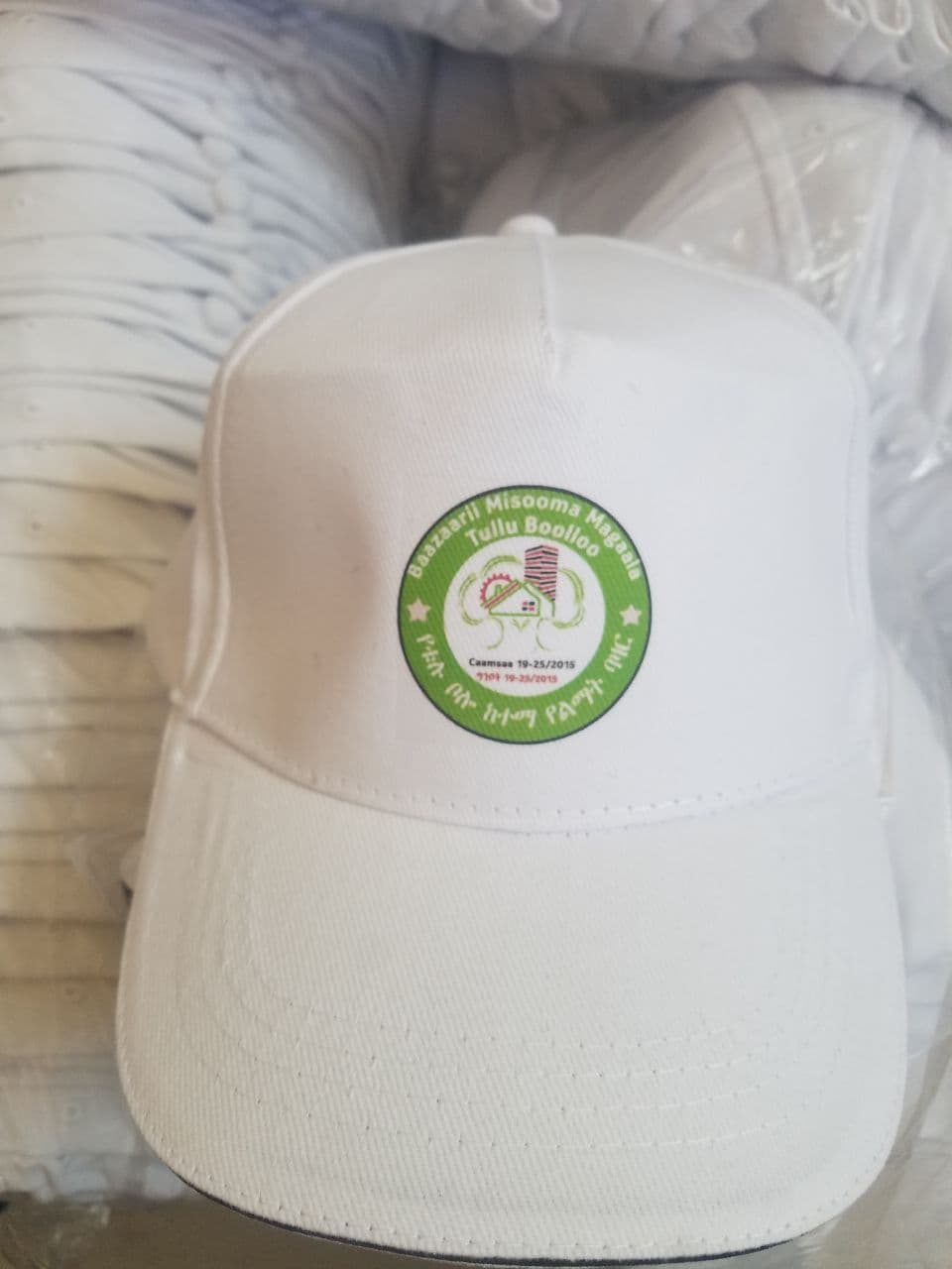 Printed event caps — Tullu Boolloo city bazaar